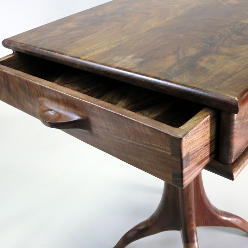 Sculpted legs Side Table made of Claro Walnut