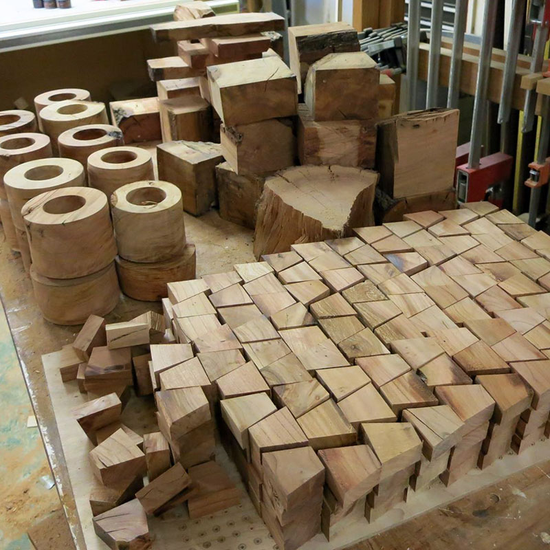 Almond wood cut into shapes for turning